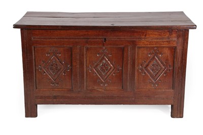 Lot 1393 - A Late 17th Century Joined Oak Chest, the hinged lid enclosing a candle box, with three lozenge...