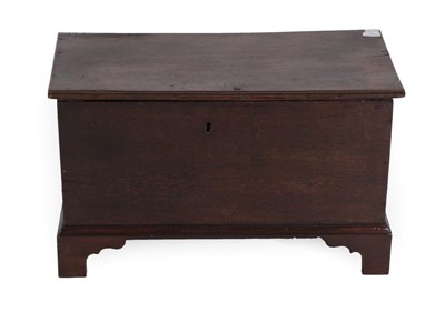 Lot 1394 - A Late 18th Century Joined Oak Chest, the moulded hinged lid enclosing a candle box, with...