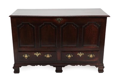 Lot 1396 - A George III Joined Oak Lancashire Mule Chest, late 18th century, the moulded hinged lid above four