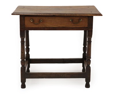 Lot 1407 - An Early 18th Century Joined Oak Side Table, the moulded top of three plank construction above...