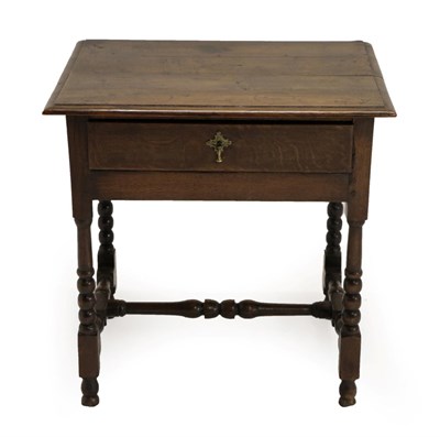 Lot 1409 - A Late 17th Century Joined Oak Side Table, the moulded top above a single frieze drawer, on...