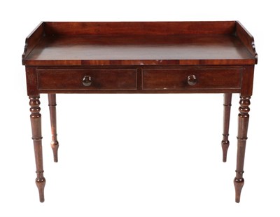 Lot 1420 - ^ An Early Victorian Mahogany Washstand, mid 19th century, with three-quarter gallery above two...