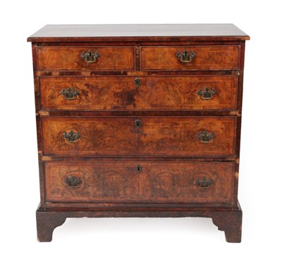 Lot 1421 - ^ A George I Walnut and Featherbanded Straight Front Chest of Drawers, early 18th century, the...