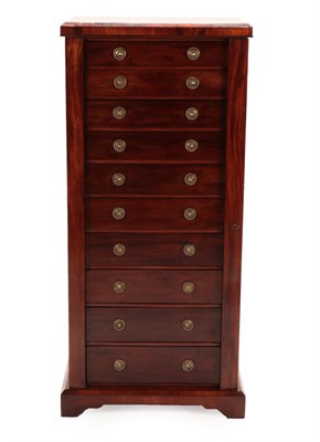 Lot 1438 - A Victorian Mahogany Wellington Chest, 3rd quarter 19th century, the ten graduated drawers with...