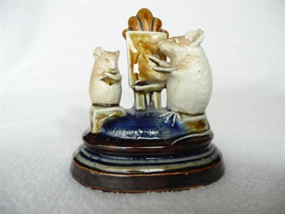 Lot 1429 - A Doulton Lambeth Stoneware "THE PAINTING" Mouse Menu Holder, by George Tinworth, with a mouse...