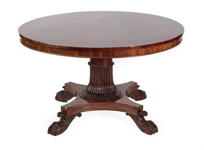 Lot 1469 - An Early Victorian Mahogany Circular Dining Table, circa 1840, with plain frieze, on a reeded...