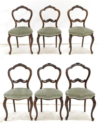 Lot 1474 - A Set of Six Victorian Rosewood Dining Chairs, circa 1870, the carved and moulded frames above...