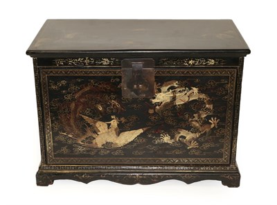 Lot 1476 - A Chinese Export Black Lacquer and Gilt Decorated Table Cabinet, the hinged lid decorated with...