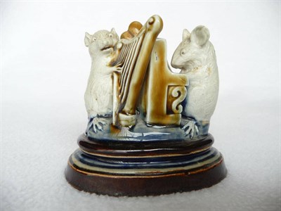 Lot 1431 - A Doulton Lambeth Stoneware Mouse Menu Holder, by George Tinworth, with two mice playing a...