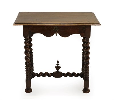 Lot 1480 - A Late 17th/Early 18th Century Continental Walnut Side Table, the moulded top above a wavy...