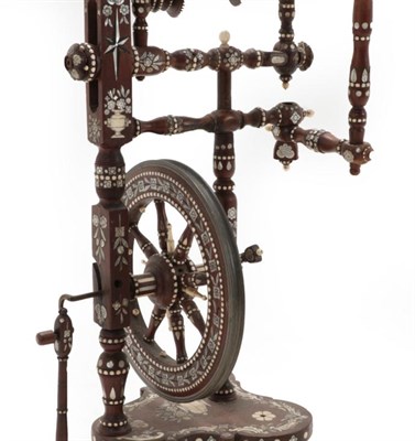 Lot 1481 - An Italian Bone and Mother-of-Pearl Inlaid Fruitwood Spinning Wheel, 19th century, the whole inlaid