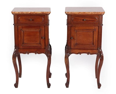 Lot 1488 - A Pair of French Walnut Bedside Cupboards, late 19th century, in Louis XVI style, the pink...