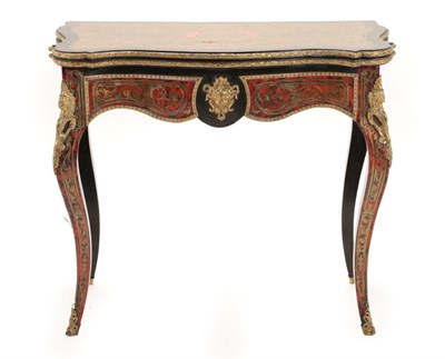 Lot 1491 - A Louis XV Style Ebonised and Red Tortoiseshell Boulle Card Table, circa 1850, of serpentine shaped