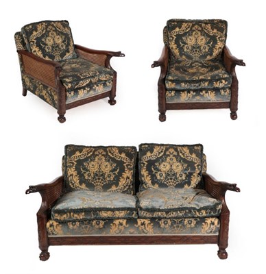 Lot 1497 - An Early 20th Century Carved Mahogany Double-Caned Three Piece Bergère Suite, recovered in...