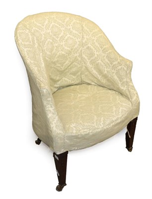 Lot 1503 - A George III Tub Framed Armchair, circa 1800, with removable green floral cover, on husk...