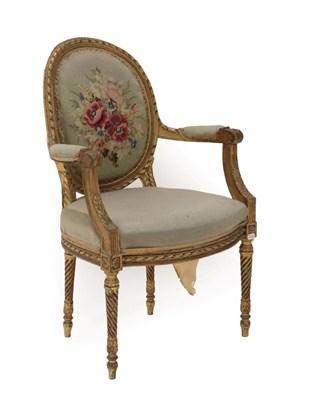 Lot 1508 - A George III Style Carved Giltwood Chair, late 19th century, recovered in floral woolwork...