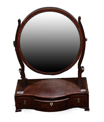 Lot 1539 - A Late George III Mahogany and Rosewood Crossbanded Toilet Mirror, early 19th century, the oval...