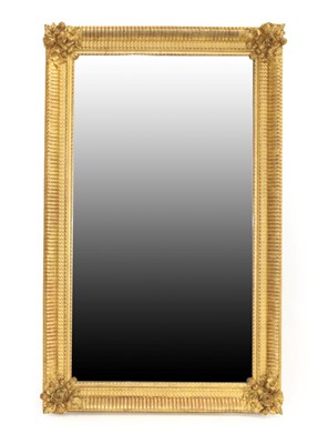 Lot 1544 - An Early Victorian Gilt and Gesso Rectangular Wall Mirror, mid 19th century, the original...