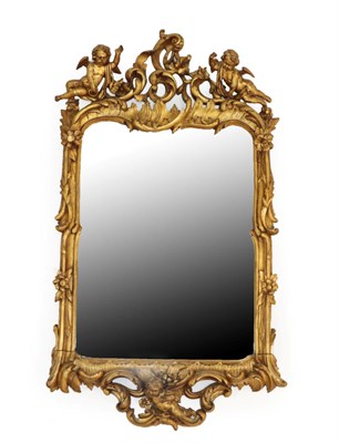 Lot 1554 - A Late 19th Century Carved Giltwood Italian Style Mirror, the later mirror plate within an acanthus