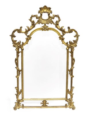 Lot 1558 - A Giltwood and Gesso Overmantel Mirror Frame, 19th century, in rococo style, of arched form...