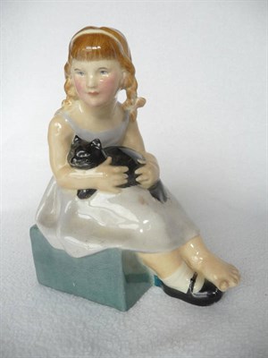 Lot 1439 - A Royal Doulton Figure "Pussy" HN18, designed by F.C.Stone, modelled as a girl with a black cat...