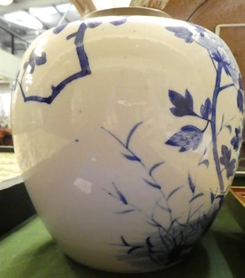 Lot 9 - A Chinese Porcelain Ginger Jar, Kangxi, of ovoid form, painted in underglaze blue with a bird...