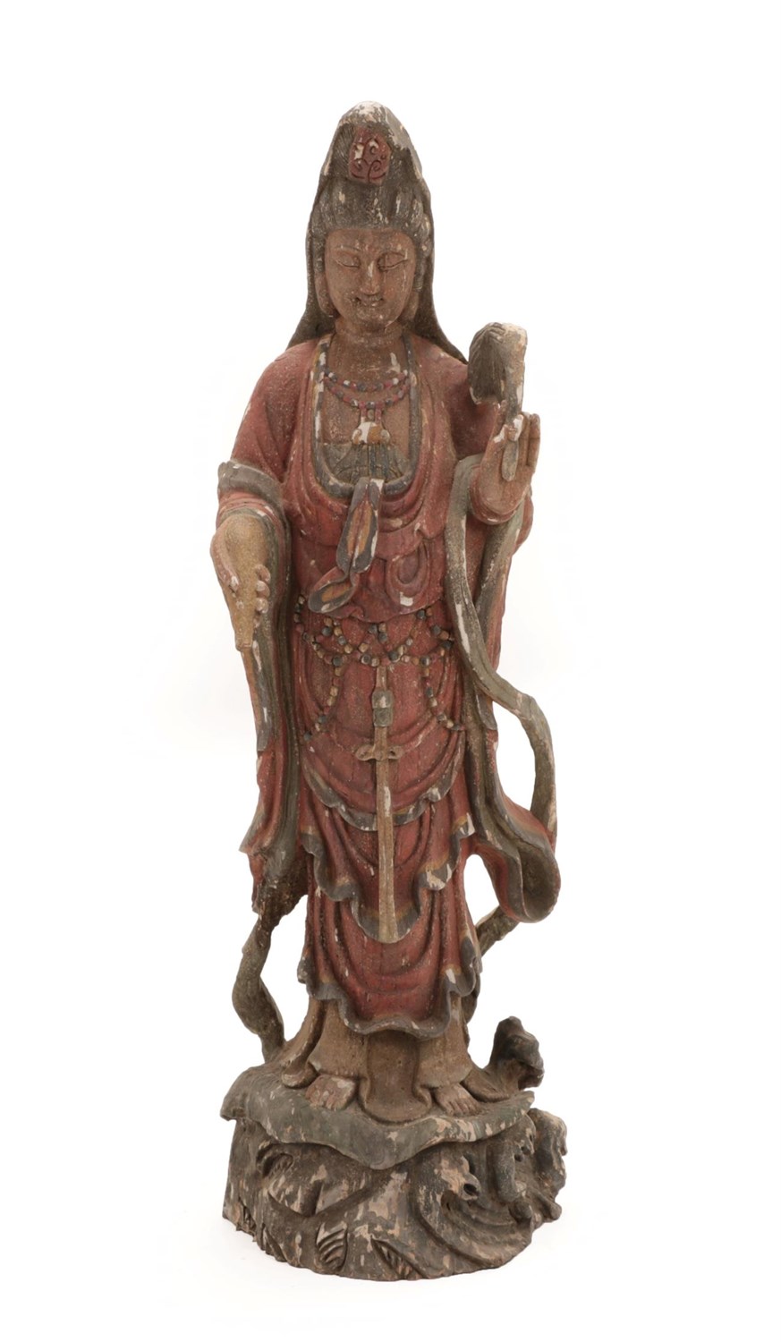 Lot 20 - A Chinese Painted Wood and Gesso Figure of Guanyin, 19th century, standing wearing flowing robes, a