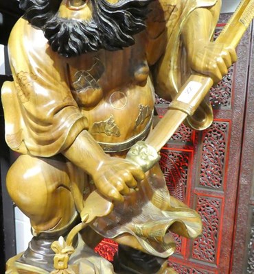 Lot 22 - A Chinese Gilt Painted and Lacquered Wood Figure of Zhong Kui, late Qing, standing on a rocky...