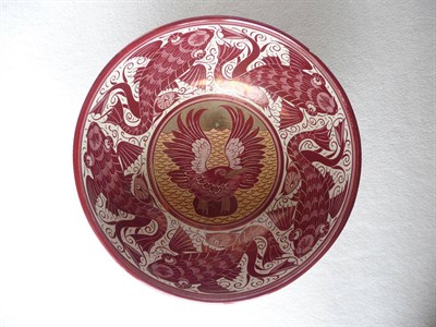 Lot 1441 - A William De Morgan Lustre Pedestal Bowl, painted by Fred Passenger, the interior decorated in ruby