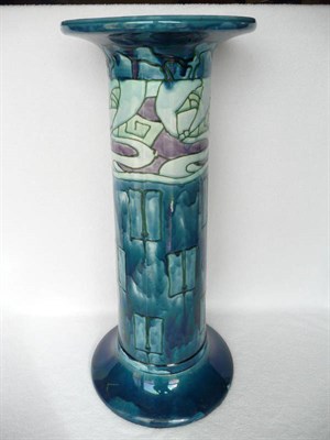 Lot 1442 - A Mintons Secessionist No.14 Pedestal, tube-lined and glazed in purple, green and blue, printed and