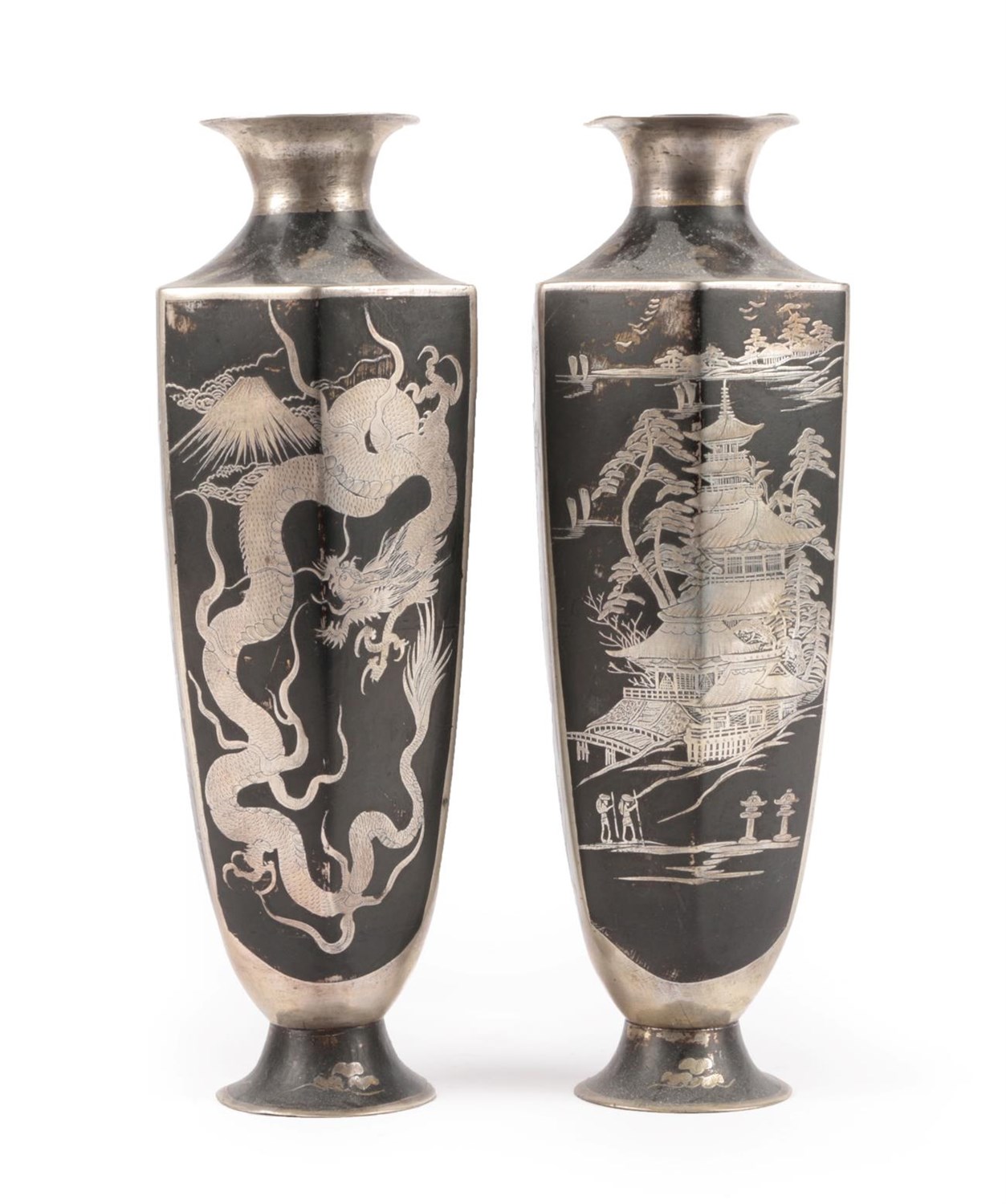 Lot 50 - A Pair of Japanese Patinated White Metal Vases, Meiji period, of octagonal baluster form, decorated