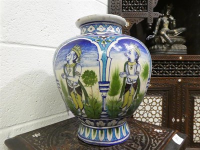 Lot 65 - An Indian Faience Vase, 19th century, of ovoid form with flared neck and foot, painted in...