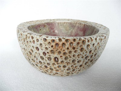 Lot 1446 - Alan Wallwork (b.1931): A Stoneware Bowl, the interior glazed pinky red, the exterior pierced...