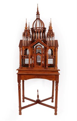 Lot 78 - A Hardwood Bird Cage, probably Indian, mid 20th century, with central dome flanked by four minarets