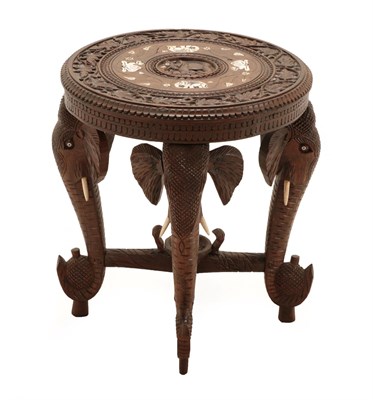 Lot 91 - An Indian Bone Inlaid Hardwood Occasional Table, 19th century, the circular top carved with an...