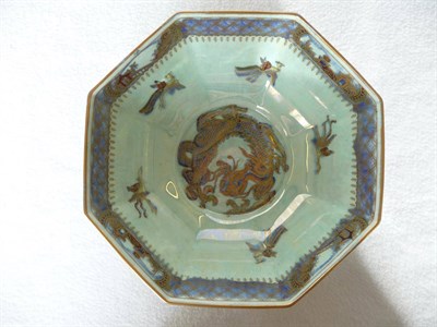 Lot 1450 - A Wedgwood Ordinary Dragon Lustre Octagonal Bowl, the interior with a central dragon surrounded...