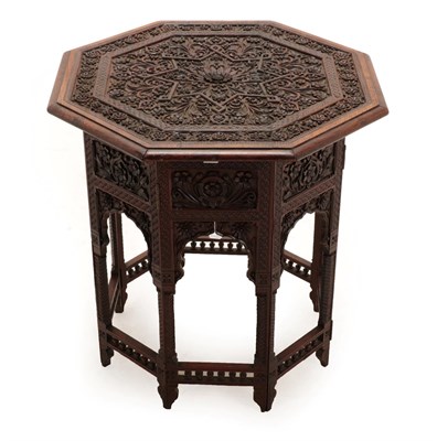 Lot 116 - An Anglo-Indian Hardwood Occasional Table, late 19th century, the octagonal top carved with...