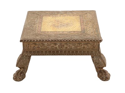 Lot 117 - An Indian Brass Low Table or Footstool, in the manner of Chagnal & Vraulal Tribhovan, Gujarat,...