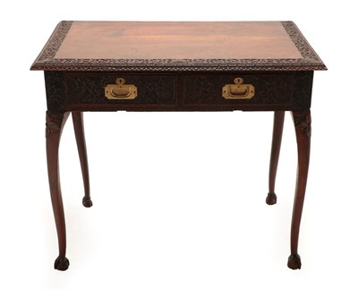Lot 126 - An Anglo-Burmese Teak Campaign Side Table, 19th century, the rectangular top with foliate...