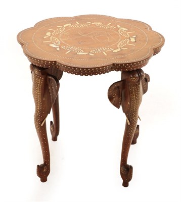 Lot 130 - An Indian Ivory Inlaid Hardwood Occasional Table, early 20th century, the octafoil top with a camel