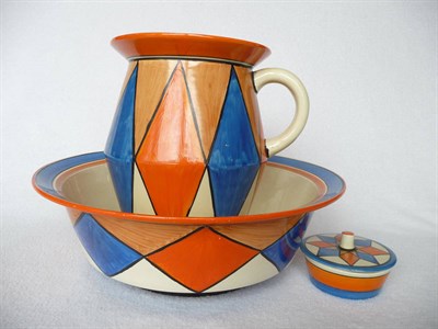 Lot 1453 - A Clarice Cliff "Original Bizarre" Toilet Set, comprising jug, basin and soap dish and cover,...