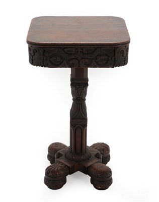 Lot 157 - An Anglo-Indian Hardwood Side Table, 19th century, the rounded rectangular top over a scroll carved