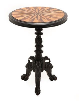 Lot 163 - An Anglo-Indian Ebony and Parquetry Tripod Table, mid 19th century, the circular top with sun burst