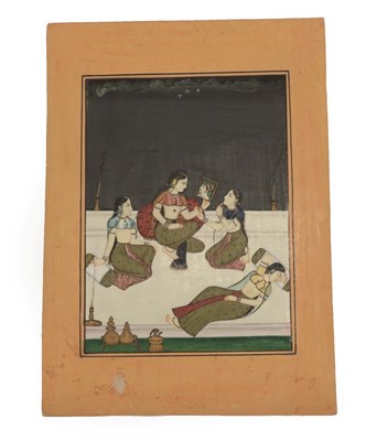 Lot 165 - Indian School (probably Bundi, late 19th century) Study of a seated lady holding a picture of...