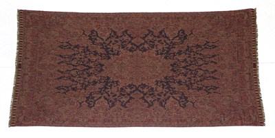 Lot 172 - A Machine Made Kashmir Shawl, circa 1900, the rust field of vines centred by a medallion...