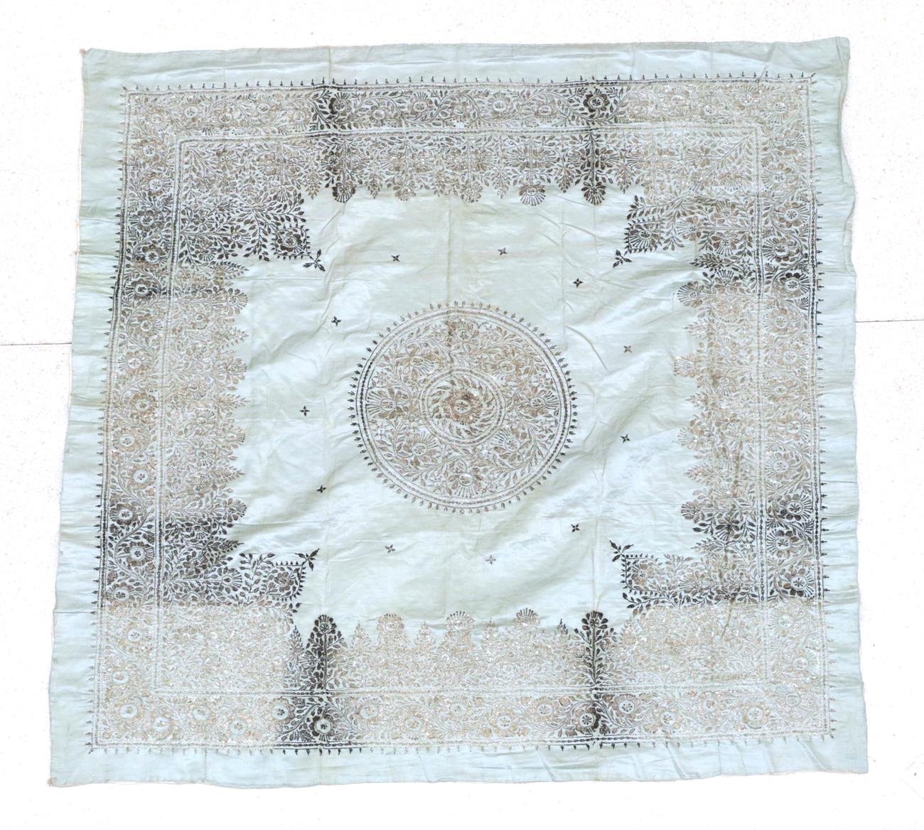 Lot 173 - Indian Silk and Metal Thread Embroidered Panel, 20th century The pale aquamarine field with central