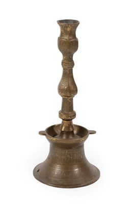 Lot 187 - An Ottoman Bronze Candlestick, 19th century, of hexagonal section baluster form on a waisted...