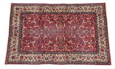 Lot 190 - Nejafabad Isfahan Carpet Central Iran, circa 1900 The blood red field with an allover design of...