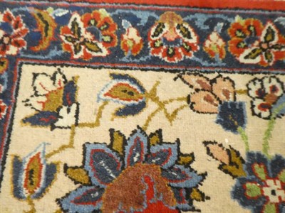 Lot 190 - Nejafabad Isfahan Carpet Central Iran, circa 1900 The blood red field with an allover design of...