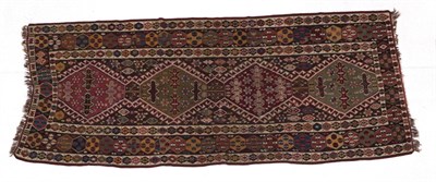 Lot 220 - Anatolian Kilim, late 19th/early 20th century The walnut brown field with a column of hooked...